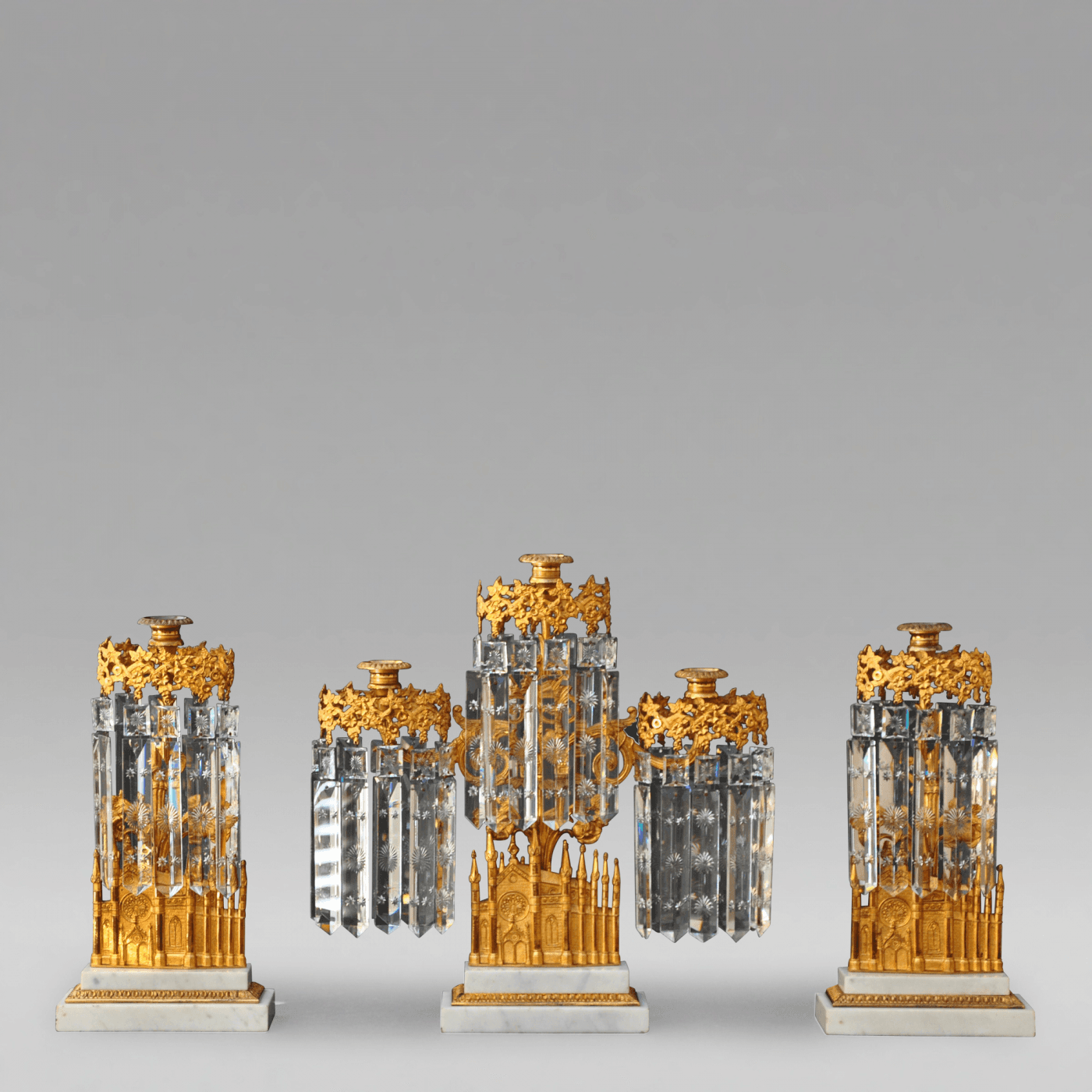 William F. Shaw three-part set of Gothic Revival girandoles, c. 1850. Offered by Charles Clark.