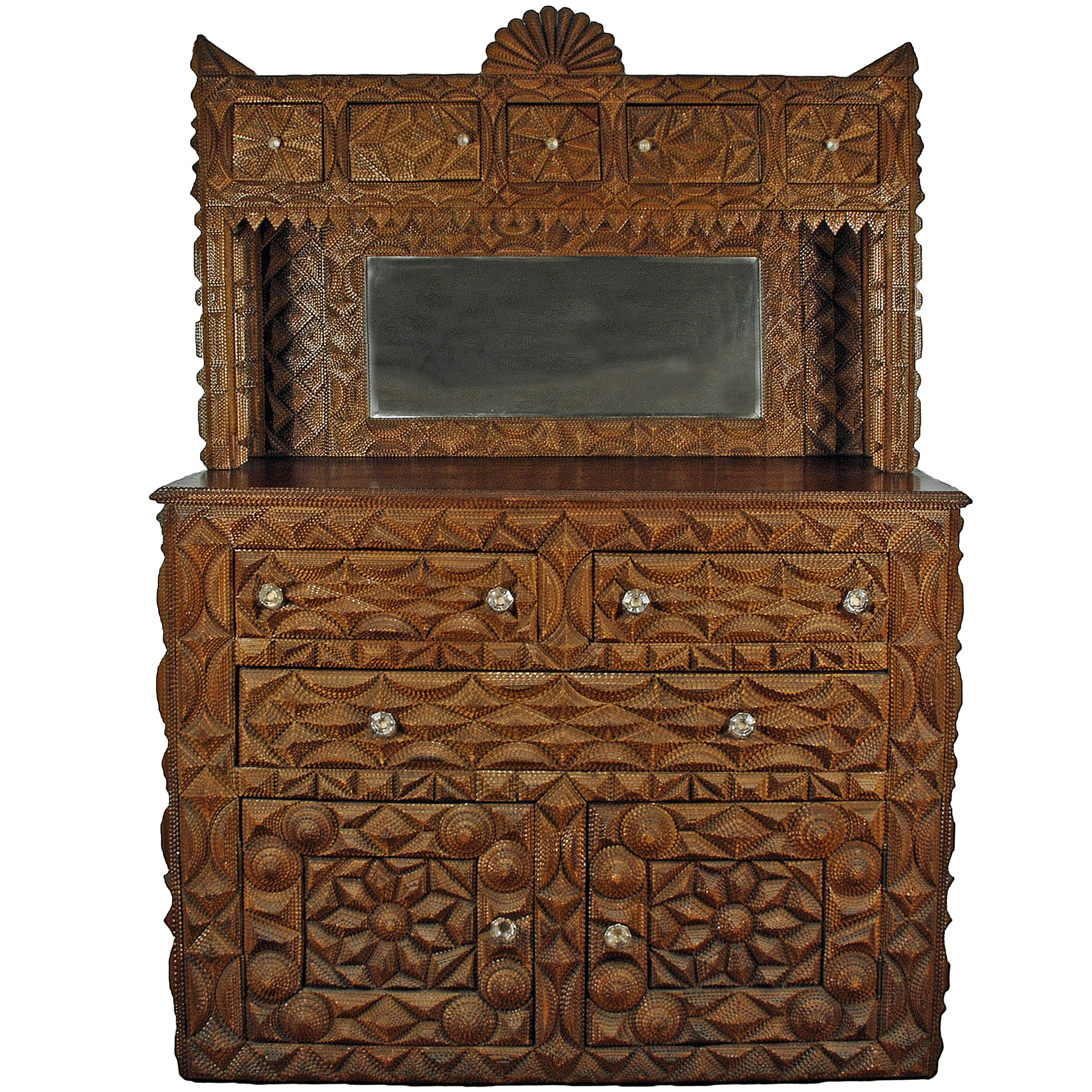 This masterful tramp art sideboard is one of the best and largest pieces of tramp art discovered. Grand in size and exquisitely detailed with hundreds of carved elements.